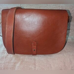 Lucky Brand The Point brown leather saddle shoulder bag.